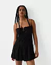 Bershka rustična mini haljina s volanima (19,99 eura)