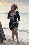 ANGUILLA, UNITED KINGDOM - *PREMIUM-EXCLUSIVE* - *DO NOT USE UNLESS FEE AGREED* *PICTURES TAKEN ON 02 JAN 2020* British Singer Adele shows off dramatic weight loss while pictured with Harry Styles and Tv presenter James Corden on Holiday together in Anguilla! The superstar singer was seen at Blanchard's beach shack on Meads Bay beach along with her security guard and a large group of friends, the group had lunch together and sang songs until sunset. Adele looked in great spirits as she enjoyed drinks on the beach and showed off her slimmer figure in pattern dress and red Neck scarf! BACKGRID UK 7 JANUARY 2020, Image: 491449260, License: Rights-managed, Restrictions: , Model Release: no, Credit line: JOE BROWN / BACKGRID / Backgrid UK / Profimedia