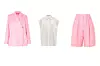 Laneni sako i bermuda hlače Remain Birgen Christensen (€341 + €173)/ bijela košulja bez rukava Acne Studios (€260)