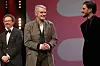 BERLIN, GERMANY - FEBRUARY 20: (L-R) Artistic Director of Berlinale Carlo Chatrian, president of the International Jury Jeremy Irons and jury member Luca Marinelli are seen on stage at the opening ceremony and
