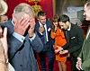 LONDON, UNITED KINGDOM - JUNE 20: Prince Charles, Prince of Wales (L) reacts as magician Dynamo (2nd R) demonstrates the flexibility of his fingers as Kenny Logan and Carol Voderman look on at a reception for the Prince's Trust Job Ambassadors to mark the appointment of one hundred Job Ambassadors at Clarence House on June 20, 2013 in London, England. (Photo by Arthur Edwards - Pool/Getty Images)