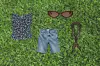 Bermude od trapera Zara (179,90 kn)/ top s uzorkom Reformation (1100 kn)/ sunčane naočale Nanushka (225 eura)/ pamučna bandana marama Massimo Dutti (199 kn)