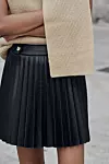 Zara kratka plisirana suknja od umjetne kože (25,95 eura)