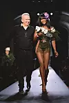 PARIS, FRANCE - JANUARY 28: (L-R) Fashion designer Jean Paul Gaultier and model Naomi Campbell walk the runway at the end of the Jean Paul Gaultier show as part of Paris Fashion Week Haute Couture Spring/Summer 2015 on January 28, 2015 in Paris, France. (Photo by Pascal Le Segretain/Getty Images)
