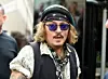Johnny Depp uživa kao rock zvijezda.