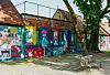 Mural pod nazivom 'Onaj dan kada je tigar pao preko vuklana' by Smelly Feet i Erol Sjajni