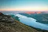 A two hour walk from Rowardennan, up the Ptarmigan Ridge, took me to just below the summit of Ben Lomond overlooking Loch Lomond and the village of Luss in the Loch Lomond and Trossachs National Park in the southern highlands of Scotland. The view, at daybreak, looks south west along Loch Lomond towards the islands of the loch and the mountains around the village of Luss.,Image: 102561308, License: Rights-managed, Restrictions: , Model Release: no