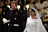 WINDSOR, UNITED KINGDOM - MAY 19: Prince Harry looks at his bride, Meghan Markle, as she arrived accompanied by Prince Charles, Prince of Wales during their wedding in St George's Chapel at Windsor Castle on May 19, 2018 in Windsor, England. (Photo by Jonathan Brady - WPA Pool/Getty Images)