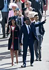 WINDSOR, ENGLAND - MAY 19: Sabrina Dhowre (L) and Idris Elba attend the wedding of Prince Harry to Ms Meghan Markle at St George's Chapel, Windsor Castle on May 19, 2018 in Windsor, England. Prince Henry Charles Albert David of Wales marries Ms. Meghan Markle in a service at St George's Chapel inside the grounds of Windsor Castle. Among the guests were 2200 members of the public, the royal family and Ms. Markle's Mother Doria Ragland. (Photo by Shaun Botterill/Getty Images)