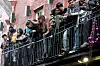 NEW ORLEANS - FEBRUARY 16: Revelers watch over Bourbon Street in the French Quarter from a balcony during Mardi Gras day on February 16, 2010 in New Orleans, Louisiana. The annual Mardi Gras celebration ends at midnight, when the Catholic Lenten season begins on Ash Wednesday and ends on Easter Sunday. (Photo by Patrick Semansky/Getty Images)