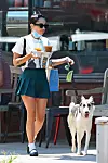 06/30/2020 EXCLUSIVE: Zoe Kravitz heads out for coffee with her dog in New York City. The 31 year old actress wore a face mask, vintage anti police t-shirt, green pleated mini skirt, white socks, and black flats.,Image: 537640083, License: Rights-managed, Restrictions: Exclusive NO usage without agreed price and terms. Please contact sales@theimagedirect.com, Model Release: no, Credit line: TheImageDirect.com / The Image Direct / Profimedia