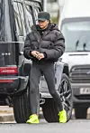 01/27/2020 EXCLUSIVE: Victoria Beckham is spotted out and about in Central London. The 45 year old fashion designer wore bright yellow neon Reebok trainers, black puffer jacket, matching leggings, and a baseball cap.,Image: 495083919, License: Rights-managed, Restrictions: Exclusive NO usage without agreed price and terms. Please contact sales@theimagedirect.com, Model Release: no, Credit line: TheImageDirect.com / The Image Direct / Profimedia
