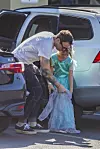 Thousand Oaks, CA - *EXCLUSIVE* - Let's face it; Noah Shannon Green is the most famous person in the Megan Fox, Brian Austin Green household. Noah was seen bravely wearing a gown and makeup to a kids birthday party! Kids can be brutal, and Noah simply doesn't care. This demonstration of self confidence at such an early age is quite impressive. Dad, Brian Austin Green, who was sporting a dainty earring in his left ear, was seen helping Noah with a wardrobe adjustment in the parking lot prior to entering the event in Thousand Oaks, CA. BACKGRID USA 3 FEBRUARY 2020, Image: 496328013, License: Rights-managed, Restrictions: , Model Release: no, Credit line: IXOLA / BACKGRID / Backgrid USA / Profimedia