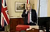 LONDON, ENGLAND - MARCH 25: Prime Minister Boris Johnson on the telephone to Queen Elizabeth II for her Weekly Audience during the coronavirus (COVID-19) pandemic at 10 Downing Street on March 25, 2020 in London, England. (Photo by Andrew Parsons-WPA Pool/Getty Images)