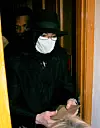 IMAGE ID # 1805916 Michael Jackson is mobbed by fans as he tries to sneak out the back door of a medical building in Beverly Hills, California this afternoon. The King of Pop kept as much as his face covered as possible as he made he way to his car, wearing a scarf over his head, a hat, and a surgical mask obscuring most of his face. Jackson did take a few moments to sign autographs for his adoring fans before hopping into his car with a packet of Kettle Chips to snack on while driving away. Despite rumors of serious financial troubles, Jackson is reportedly leasing a mansion in the ritzy Bel-Air section of Los Angeles for a whopping 0,000 a month. CR: Oâ€™Duran 01/14/2009 --- Michael Jackson --- - 310-395-0500 / Sales: 310-395-0500, Image: 29017463, License: Rights-managed, Restrictions: , Model Release: no, Credit line: FAME PICTURES / Backgrid USA / Profimedia