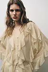Zara bluza s volanima (39,95 eura)