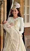 LONDON, ENGLAND - OCTOBER 23: Catherine, Duchess of Cambridge carries her son Prince George Of Cambridge after his christening at the Chapel Royal in St James's Palace on October 23, 2013 in London, England. (Photo by John Stillwell - WPA Pool /Getty Images)