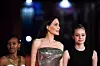 TIZIANA FABI AFP US actress Angelina Jolie arrives with her daughters Zahara Jolie-Pitt (L) and Shiloh Jolie-Pitt (R) for the screening of the film ”Eternals” on October 24, 2021 at the Auditorium Parco della Musica venue in Rome, during the 16th Rome Film Festival. Zahara Jolie-Pitt (Photo by Tiziana FABI/AFP)
