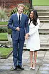 LONDON, ENGLAND - NOVEMBER 27: Prince Harry and Meghan Markle during an official photocall to announce the engagement of Prince Harry and actress Meghan Markle at The Sunken Gardens at Kensington Palace on November 27, 2017 in London, England. Prince Harry and Meghan Markle have been a couple officially since November 2016 and are due to marry in Spring 2018. (Photo by Chris Jackson/Getty Images)