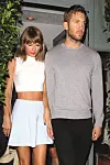 Santa Monica, CA - Taylor Swift and boyfriend Calvin Harris hold hands after a romantic dinner date at Giorgio Baldi Italian restaurant in Santa Monica. The 25-year-old singer showed off her slender figure in a white crop top and baby blue mini skirt. Taylor used Twitter to shoot down reports that she was buying a 16th century castle in Scotland. She tweeted, ‚ÄėCause baby I could build a castle out of all the bricks they threw at me‚Ä¶But I‚Äôm not actually buying a castle.‚ÄĚ. August 11, 2015,Image: 255354693, License: Rights-managed, Restrictions: NO Brazil,NO Brazil, Model Release: no, Credit line: AKM Images / Backgrid USA / Profimedia