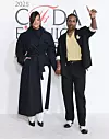 A$AP Rocky nosio je Chanel odijelo u kombinaciji s maslac žutim puloverom s V izrezom