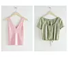 Rebrasta majica bez rukava 49 dolara/ crop top s gumbićima 59 dolara