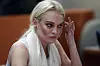 Actress Lindsay Lohan listens as a judge revokes her probation for failing to appear at a series of community service appointments at the Los Angeles Superior Court Airport Branch Courthouse during a progress report hearing in Los Angeles on October 19, 2011., Image: 105054848, License: Rights-managed, Restrictions: , Model Release: no, Credit line: MARK BOSTER / UPI / Profimedia
