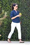 *EXCLUSIVE* Los Angeles, CA - Actress and busy mother Sandra Bullock spent the day at a Sound Studio where she kept herself busy doing voice-over work for her character Scarlett Overkill for the upcoming animation film 'The Minions', she kept her look simple with a navy blue and white polka dot blouse, white trousers and strappy sandals matching her brown leather tote bag. April 10, 2014,Image: 190114958, License: Rights-managed, Restrictions: NO Brazil,NO Brazil, Model Release: no, Credit line: AKM Images / Backgrid USA / Profimedia