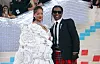 Mandatory Credit: Photo by Guerin Charles/ABACA/Shutterstock (13894852l) Pregnant Rihanna along with Asap Rocky attends the 2023 Costume Institute Benefit celebrating Karl Lagerfeld: A Line of Beauty at Metropolitan Museum of Art in New York City, NY, USA on May 01, 2023. Pregnant Rihanna Attends The Met Gala - NYC, New York City, United States - 01 May 2023
