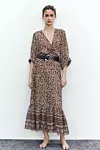 Zara midi haljina s uzorkom i volanima (39,95 eura)