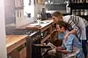 Shot of a young couple checking up on their bread in the ovenhttp://195.154.178.81/DATA/i_collage/pu/shoots/804513.jpg