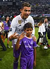 CARDIFF, WALES - JUNE 03: Cristiano Ronaldo of Real Madrid CF celebrates with his son Cristiano Ronaldo Jr. after the UEFA Champions League Final between Juventus and Real Madrid at National Stadium of Wales on June 3, 2017 in Cardiff, Wales. (Photo by David Ramos/Getty Images)