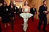 TOPSHOT - US actress Emma Stone (C) attends the 96th Annual Academy Awards at the Dolby Theatre in Hollywood, California on March 10, 2024. (Photo by Valerie Macon/AFP)