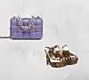 Torba s lancem Bottega Veneta (3035 funti)/ klompe na petu GCDS (483 eura)