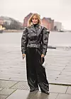 COPENHAGEN, DENMARK - JANUARY 28: Josefine Haaning Jensen seen wearing black leather jacket, wide leg pants, micro bag outside 7 Days on Day 1 during Copenhagen Fashion Week Autumn/Winter 2020 on January 28, 2020 in Copenhagen, Denmark. (Photo by Christian Vierig/Getty Images)