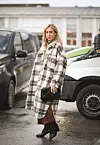 COPENHAGEN, DENMARK - JANUARY 30: Sonia Lyson wearing a Bottega Veneta bag and Louis Vuitton boots before Stand Studio on January 30, 2020 in Copenhagen, Denmark. (Photo by Jeremy Moeller/Getty Images)