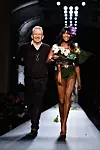 PARIS, FRANCE - JANUARY 28: (L-R) Fashion designer Jean Paul Gaultier and model Naomi Campbell walk the runway at the end of the Jean Paul Gaultier show as part of Paris Fashion Week Haute Couture Spring/Summer 2015 on January 28, 2015 in Paris, France. (Photo by Pascal Le Segretain/Getty Images)