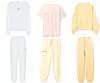 Pamučni komplet Acne Studios ($350 + $340) / / Pangaia t-shirt i hlače (85 $ + 120 $)/Frankie Shop pamučna trenirka ($160 + $150)