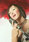 Ivana Kindl 2002. nosila je kratku smeđu kosu.