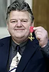 Robbie Coltrane za svoj je doprinos glumi dobio i kraljičin orden