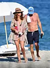 *PREMIUM EXCLUSIVE* Cindy Crawford and husband, Rande Gerber look relaxed as they hit the beach on New Year's Day in Miami. Supermodel Cindy, 53, looked stunning with a shawl over a green bikini, topping off her chic look with a straw fedora. 01 Jan 2020, Image: 490672639, License: Rights-managed, Restrictions: World Rights, Model Release: no, Credit line: BackGrid/MEGA / Mega Agency / Profimedia