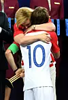 MOSCOW, RUSSIA - JULY 15: President of Croatia, Kolinda Grabar Kitarovic greets Luka Modric of Croatia as he is presented with his runners-up medal after the 2018 FIFA World Cup Final between France and Croatia at Luzhniki Stadium on July 15, 2018 in Moscow, Russia. (Photo by Shaun Botterill/Getty Images)
