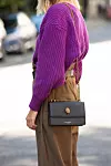 LONDON, ENGLAND - SEPTEMBER 15: Linda Tol wears Frankie shop trousers and belt, Loulou Studio sweater and a Kurt Geiger bag on September 15, 2019 in London, England. (Photo by Kirstin Sinclair/Getty Images for Kurt Geiger)