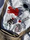 Stvari za plažu u kozmetičkoj torbici