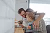 Photo of a young family who enjoy their moments together at home