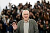 US actor Robert De Niro waves during a photocall for the film ”Bread and Roses” at the 76th edition of the Cannes Film Festival in Cannes, southern France, on May 21, 2023. (Photo by Patricia DE MELO MOREIRA/AFP)