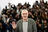 US actor Robert De Niro waves during a photocall for the film ”Bread and Roses” at the 76th edition of the Cannes Film Festival in Cannes, southern France, on May 21, 2023. (Photo by Patricia DE MELO MOREIRA/AFP)