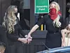 US actor Amber Heard (red facemask) arrives at The High Court in Central London with her sister Whitney Heard. Johnny Depp's libel trial against The Sun newspaper is due to take place over the next three weeks over allegations he was violent and abusive towards his ex-wife Amber Heard. Johnny Depp libel case, London, UK - 07 Jul 2020,Image: 540928461, License: Rights-managed, Restrictions: , Model Release: no, Credit line: Peter MacDiarmid / Shutterstock Editorial / Profimedia