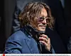 Johnny Depp arrives at The Royal Courts of Justice of Justice on the first day of his libel trial against The Sun newspaper. Johnny Depp v The Sun libel trial, The Royal Courts of Justice, London, UK - 07 Jul 2020 Johnny Depp's trial against The Sun newspaper. Depp is suing the publication over a report by Dan Wootton which alleged Depp had been abusive to his former wife Heard, who's expected to give evidence at some point during the ten day trial. Postponed due from March due to coronavirus, with the trial now to take place with social distancing measures in place.,Image: 540942863, License: Rights-managed, Restrictions: Rex Features Ltd. do no, Model Release: no, Credit line: - / Shutterstock Editorial / Profimedia