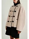 Totem Leather-trimmed shearling jacket (2,350 eura)